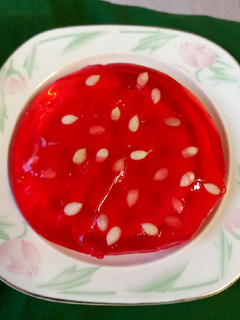 A picture of Strawberry jelly with nuts🍓🍓.