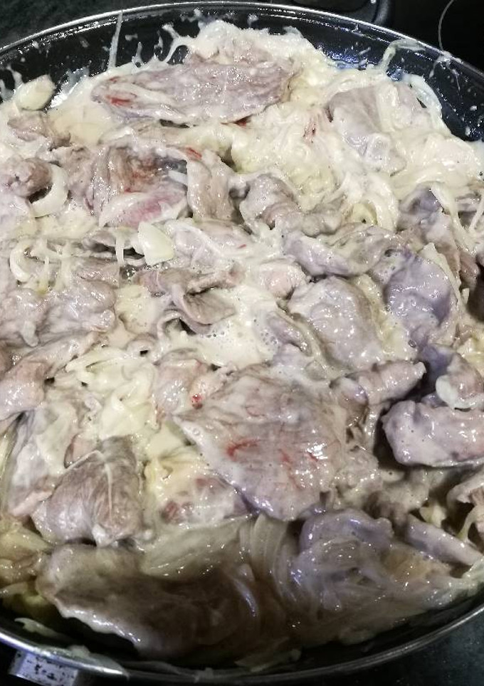 Una foto de Filetes encebollados con queso