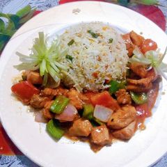A picture of Shashilk with fried rice.