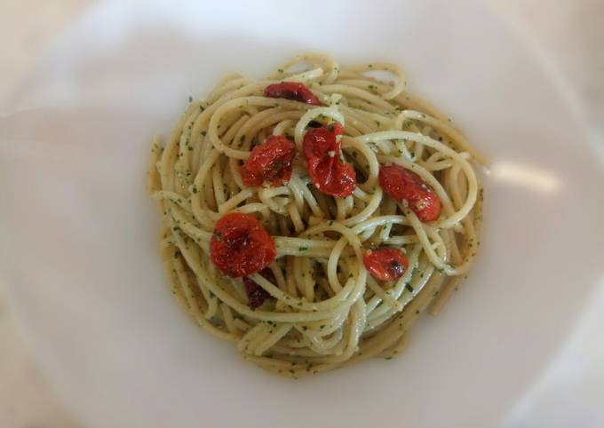 Spaghetti with walnut pesto and roasted tomatoes