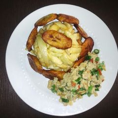 A picture of Fry Irish potatoes, plantain with scrambled egg.