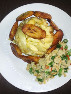 A picture of Fry Irish potatoes, plantain with scrambled egg.