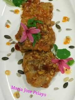 Una foto de Lengua rebozada con tomate y almendras