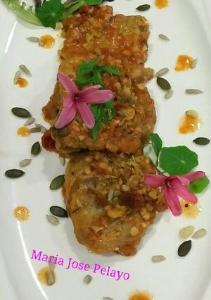Una foto de Lengua rebozada con tomate y almendras