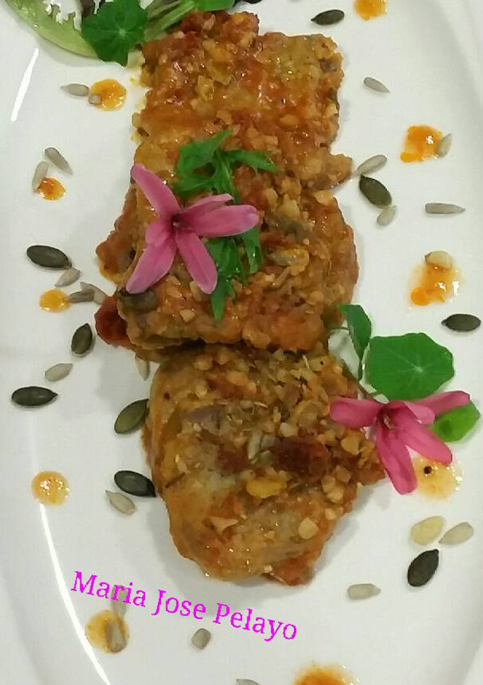 Una foto de Lengua rebozada con tomate y almendras