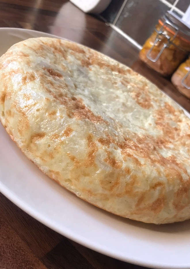 Una foto de Tortilla de patatas • Tortilla española