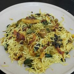 A picture of Mushroom peas and corn biryani.
