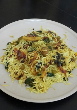 A picture of Mushroom peas and corn biryani.