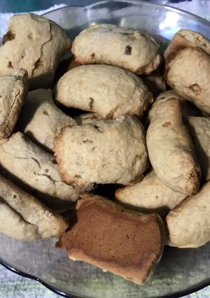 Una foto de Galletitas de naranja veganas rellenas de chocolate