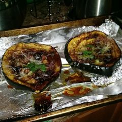 A picture of Sweet & Fruity Blueberry-Plum Baked Acorn Squash.