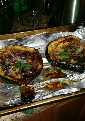 A picture of Sweet & Fruity Blueberry-Plum Baked Acorn Squash.
