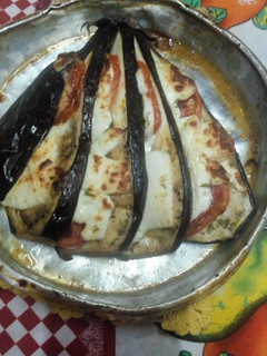 Una foto de Librito de berenjena🍆 Tomate🍅 & Queso🧀