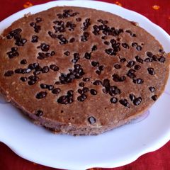 A picture of Chocolate brownie with choco chips.