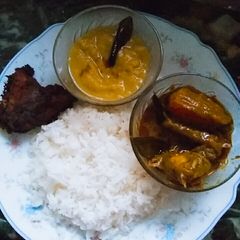 Fish curry with rice & fried fish A picture of Fish curry with rice & fried fish.