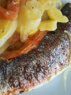 Una foto de Dorada al horno con eneldo