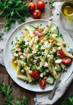A picture of Warm Pasta Salad with Cucumber, Cherry Tomatoes, and Chickpeas.