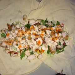 A picture of Homemad chicken wrap.