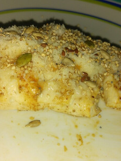 Una foto de Pechuga de pollo con Grana Padano y semillas