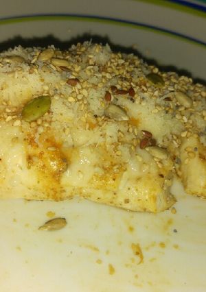 Una foto de Pechuga de pollo con Grana Padano y semillas