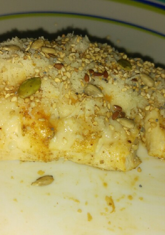 Una foto de Pechuga de pollo con Grana Padano y semillas