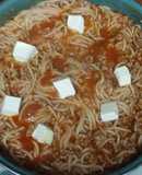 Spaghetti rojo con carne molida