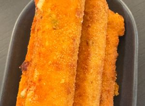 Foto de Palitos de batata com queijo e bacon