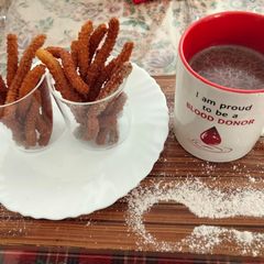 A picture of #2021challenge#Mexican churros and hot chocolate, eggless.
