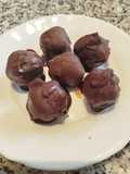 Bolitas de coco rallado con yogur y cobertura de chocolate