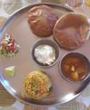 Puri, batata rassa, Masalebhat, shrikhand & Koshimbir