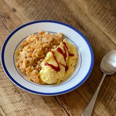 A picture of Chicken Omurice - the old classic Japanese comfort meal, chicken kitchup rice with omlette.
