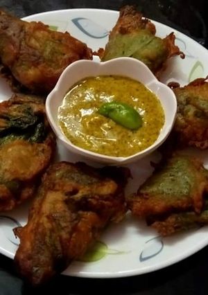 A picture of Stuffed Bottle gourd leaves.