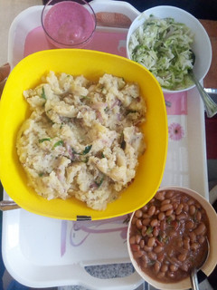 A picture of Mashed potatoes, beans & steamed cabbage dinner.