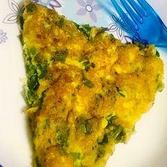 A picture of Spinach omelette soufflé with spring onions.