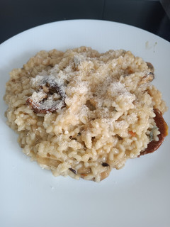 Una foto de Risotto Gorgonzola con camarón y mejillones