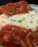Brótola en crema de pimiento rojo con guarnición de arroz con vegetales