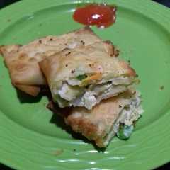A picture of Pangsit Goreng isi Tempe & Sayur.