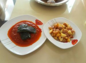 Una foto de Filete de pescado en chile gualillo y hoja santa