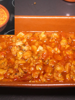 Una foto de Carne de almejas con salsa de tomate picante