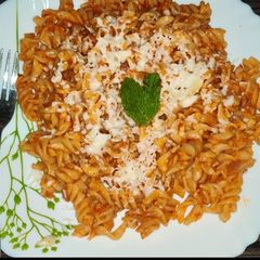 A picture of Pasta in red sauce.