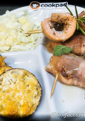 A picture of Baked Trout Rolls with Eggplant and Cabbage Slaw.