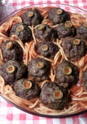 A picture of Halloween Eyeballs in Worms (spaghetti & meatballs).