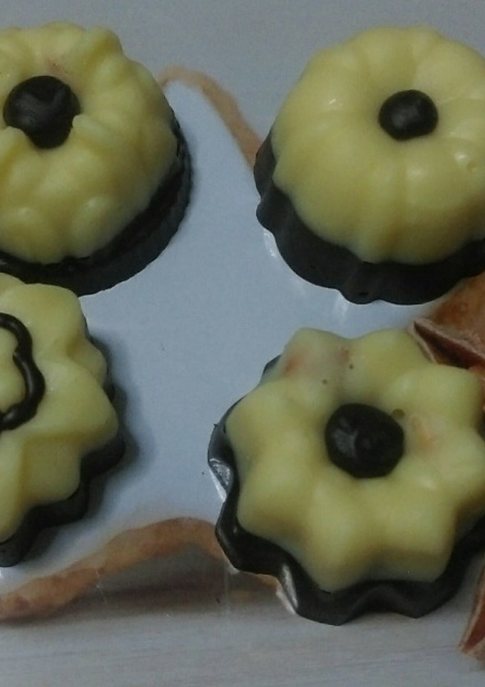 Una foto de Bombones de dos chocolates, almendras y Bergamota