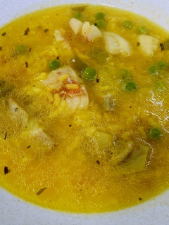 Una foto de Arroz caldoso de gallineta y alcachofas