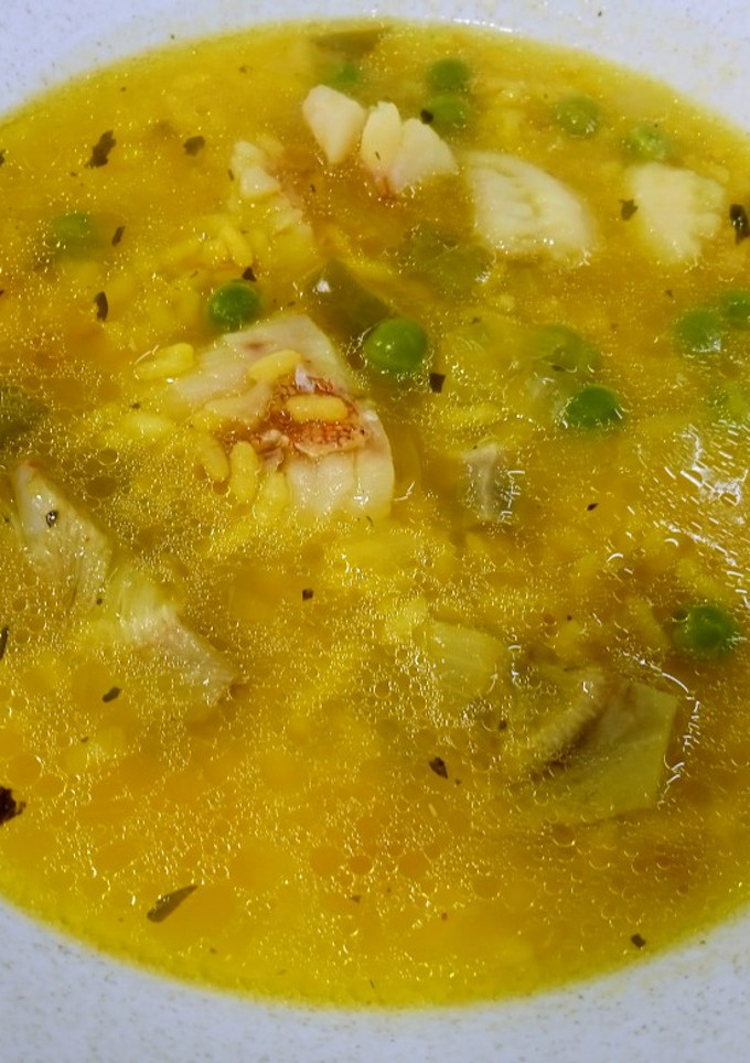 Una foto de Arroz caldoso de gallineta y alcachofas