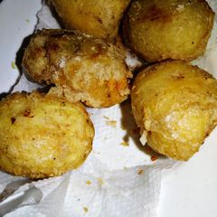 A picture of Deep fried jacket potatoes.