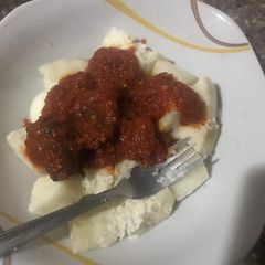 A picture of Goat Meat Stew and Boiled Yam.
