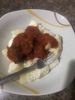 A picture of Goat Meat Stew and Boiled Yam.
