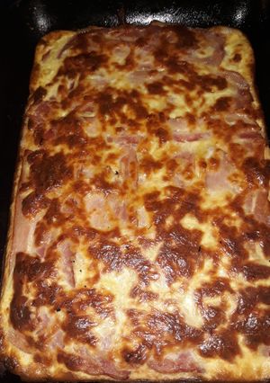 Una foto de Torta de panceta y queso