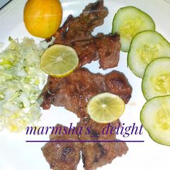 A picture of Pan grill lamb in lemon marinade.