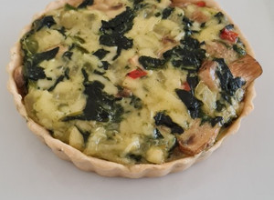 Una foto de Quiche de espinaca y champiñón
